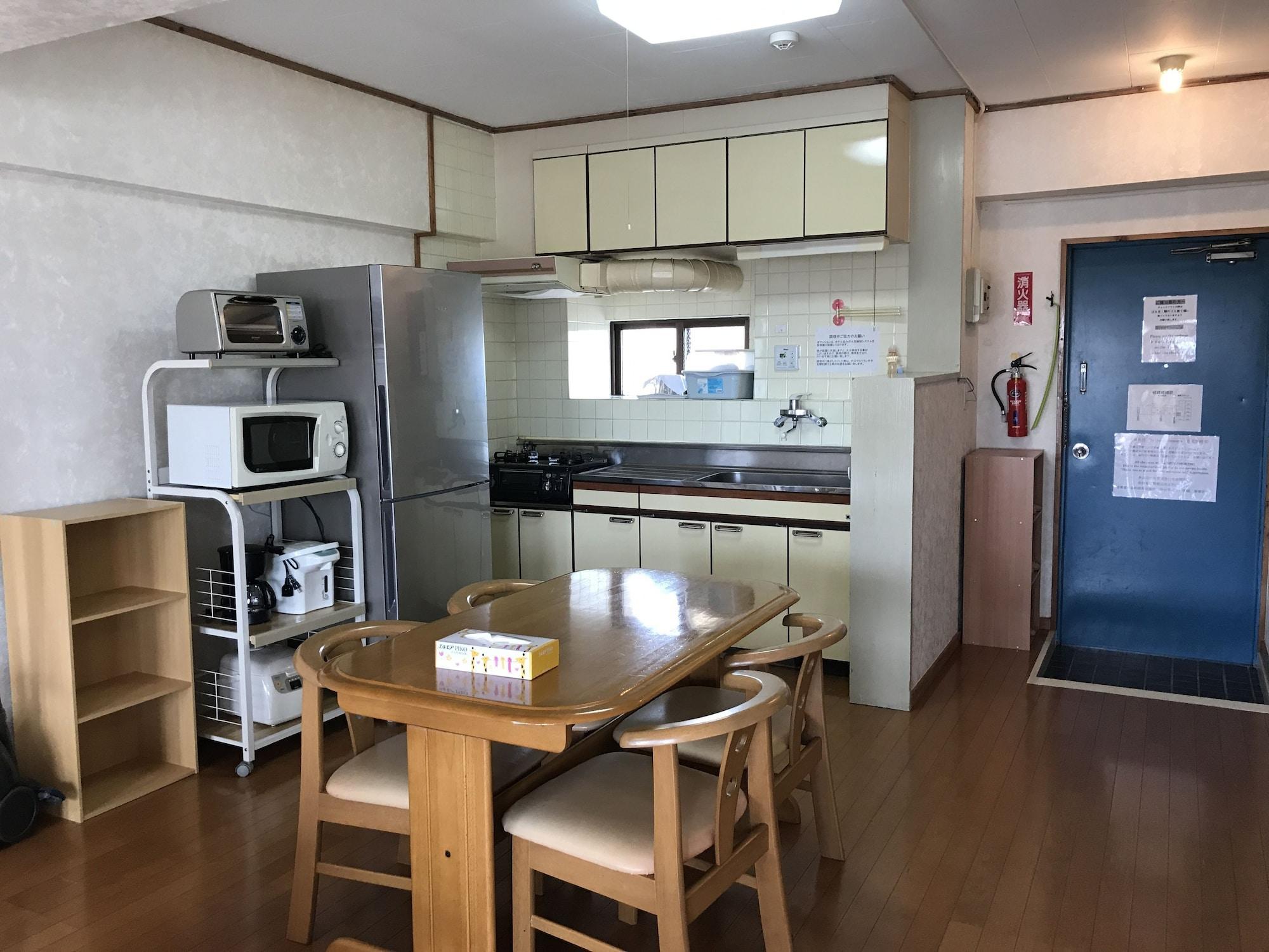 Weekly Harbourview Mansion Main Building Apartment Наха Екстериор снимка
