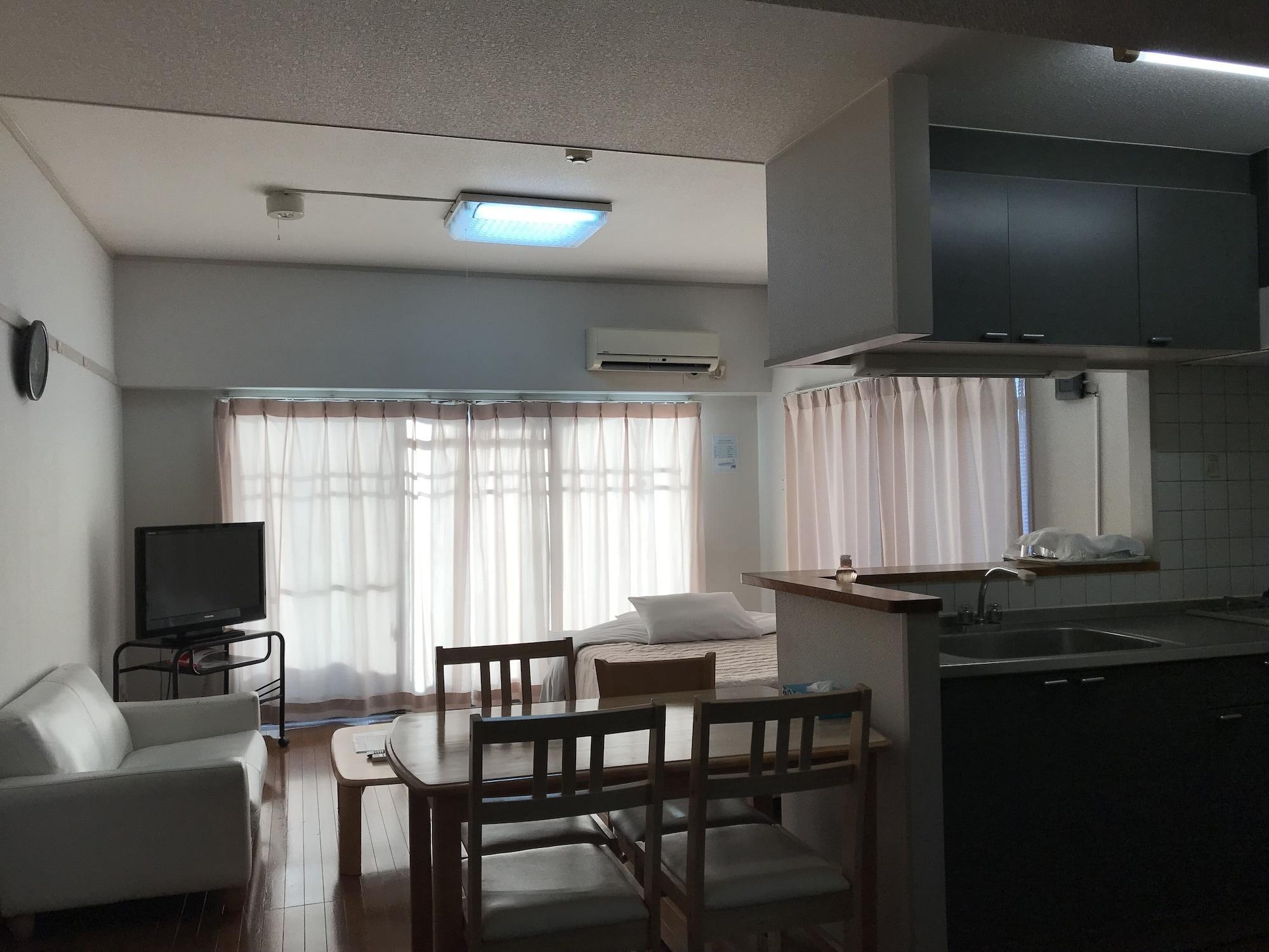 Weekly Harbourview Mansion Main Building Apartment Наха Екстериор снимка