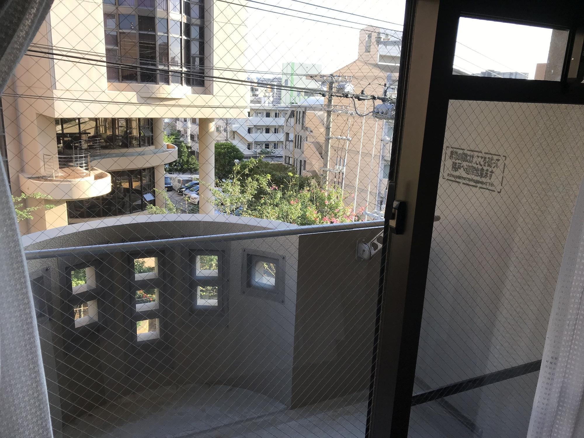 Weekly Harbourview Mansion Main Building Apartment Наха Екстериор снимка
