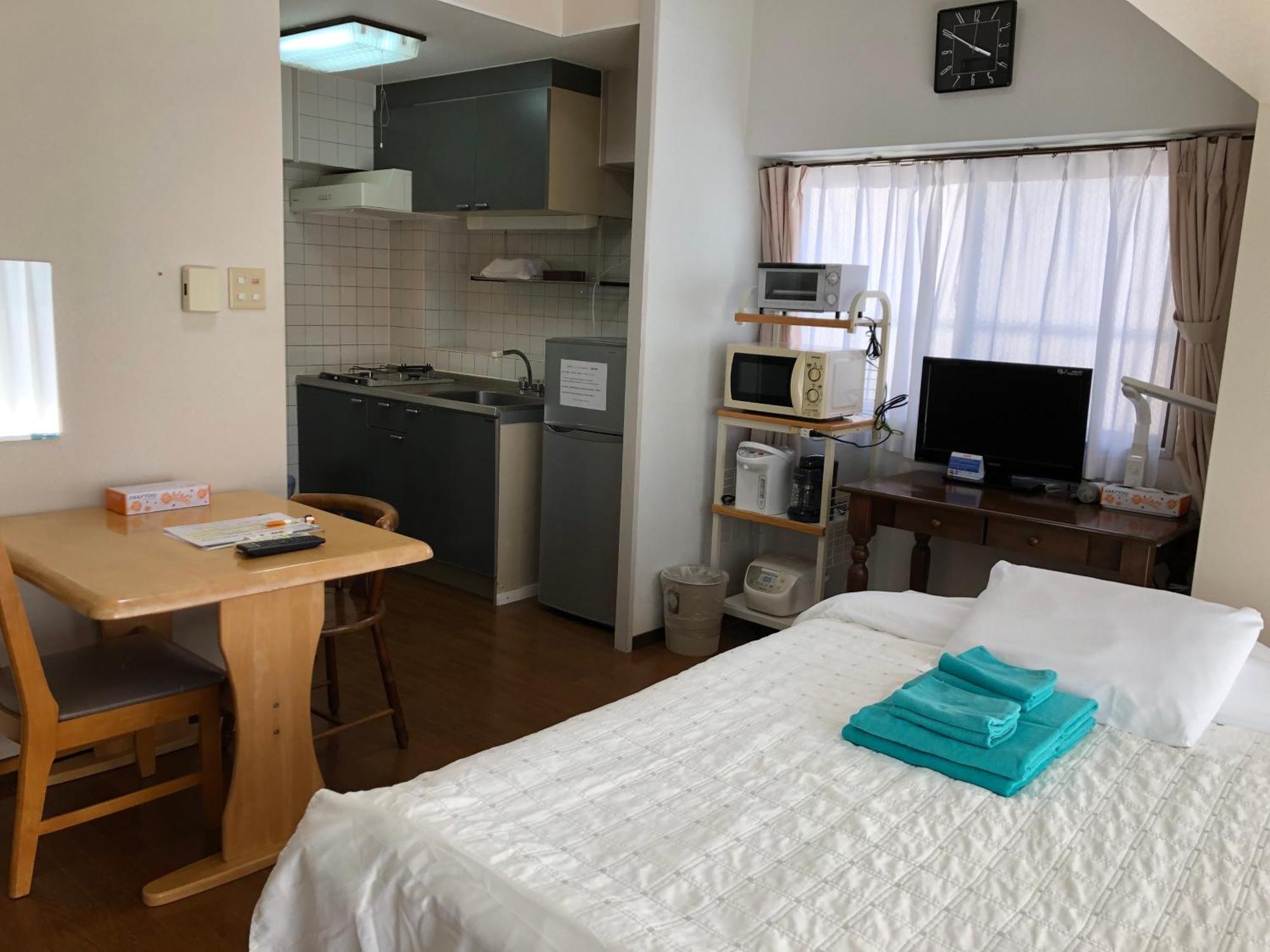 Weekly Harbourview Mansion Main Building Apartment Наха Екстериор снимка