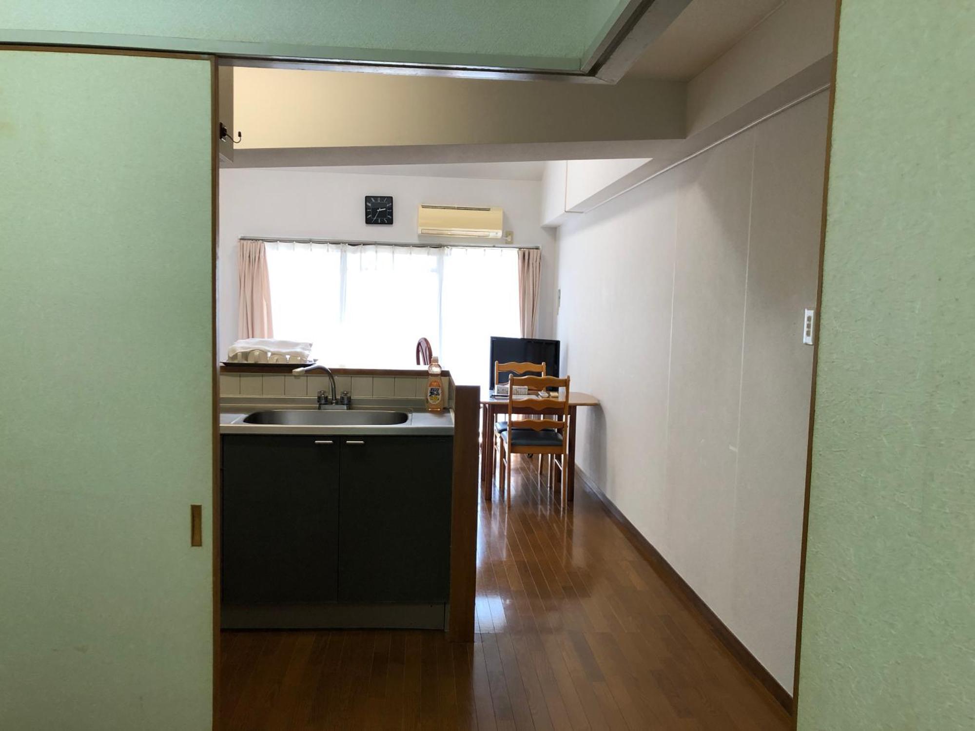 Weekly Harbourview Mansion Main Building Apartment Наха Екстериор снимка