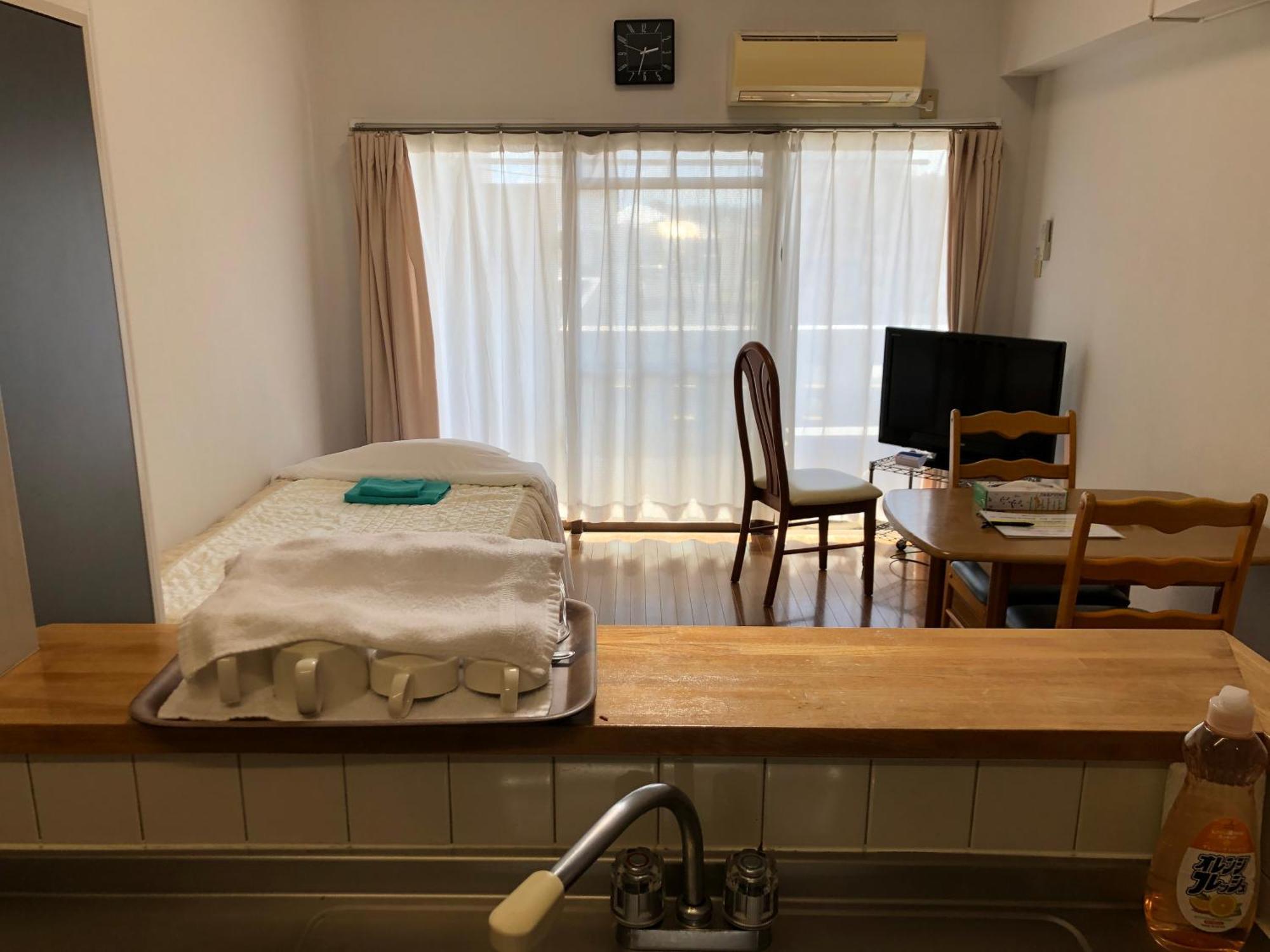 Weekly Harbourview Mansion Main Building Apartment Наха Екстериор снимка